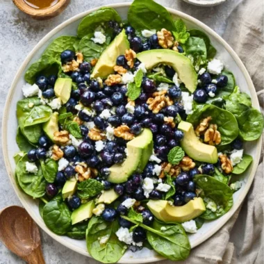 Delicious spinach blueberry salad with vibrant ingredients in a bowl