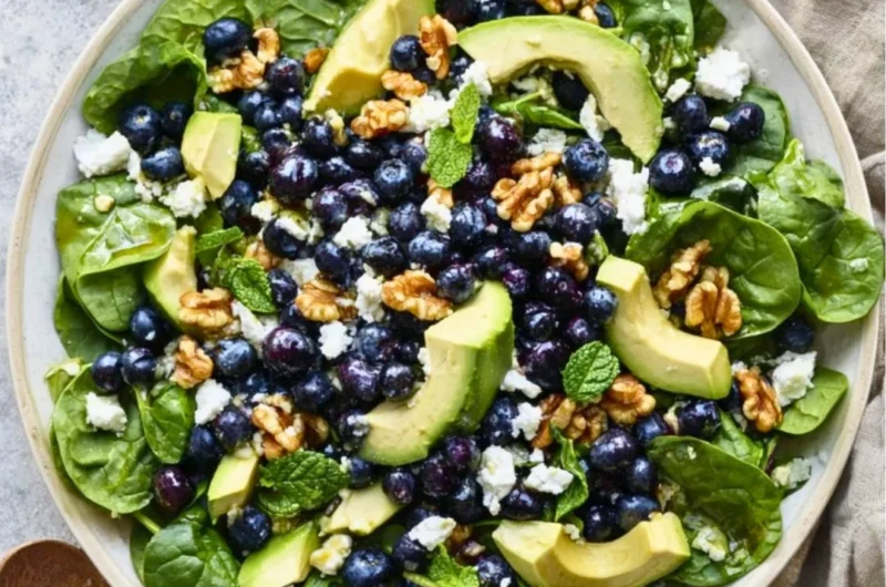 Delicious spinach blueberry salad with vibrant ingredients in a bowl