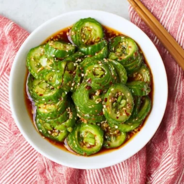 Fresh Asian cucumber salad with crunchy veggies and dressing