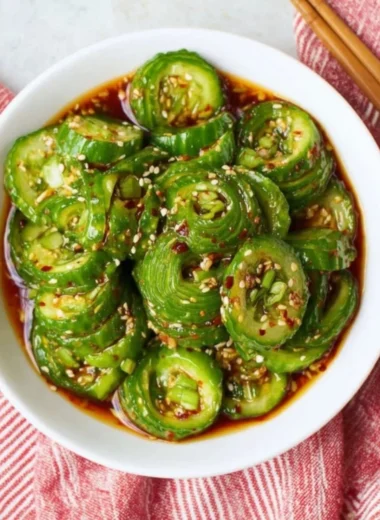 Fresh Asian cucumber salad with crunchy veggies and dressing
