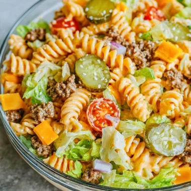 Big Mac Pasta Salad featuring ground beef, lettuce, and cheese in a pasta dish
