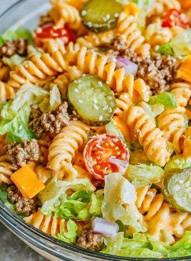 Big Mac Pasta Salad featuring ground beef, lettuce, and cheese in a pasta dish
