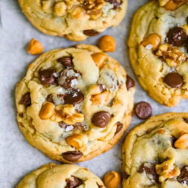 Delicious butterscotch chocolate chip cookies on a baking tray.