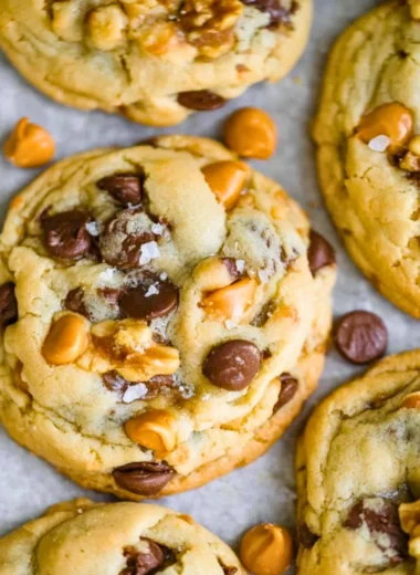 Delicious butterscotch chocolate chip cookies on a baking tray.