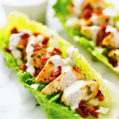Chicken Bacon Ranch Lettuce Wraps on a plate with fresh ingredients