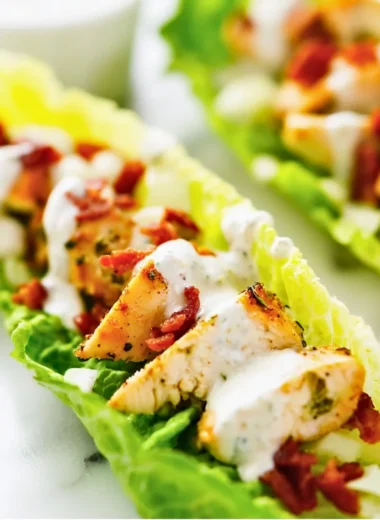 Chicken Bacon Ranch Lettuce Wraps on a plate with fresh ingredients