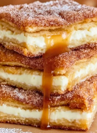 Delicious Churro Cheesecake topped with cinnamon and sugar