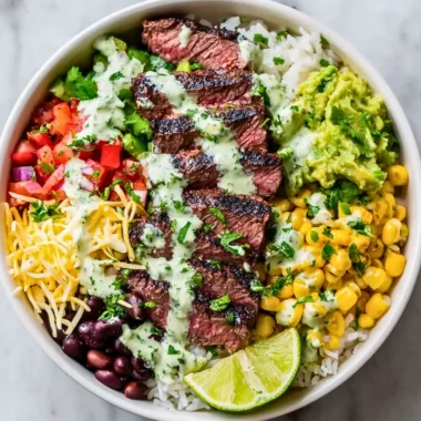 Cilantro lime steak bowl with fresh vegetables and steak slices