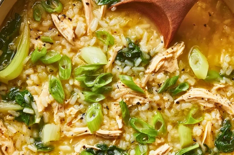 Ginger chicken and rice soup with bok choy in a bowl