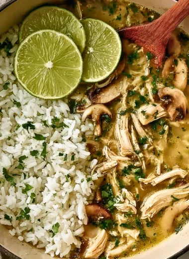 Ginger lime chicken soup with mushrooms and cilantro rice garnish