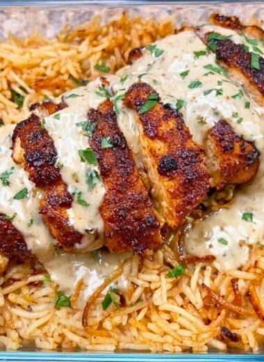 High protein creamy Cajun chicken served with rice in a bowl