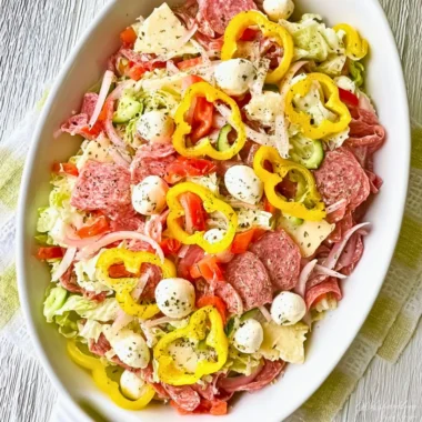 Two variations of a vibrant Italian Sub Salad with fresh ingredients