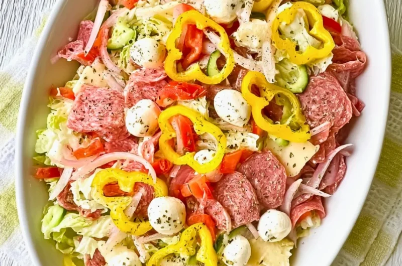 Two variations of a vibrant Italian Sub Salad with fresh ingredients