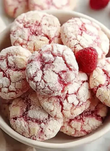 Delicious raspberry sugar cookies on a baking tray