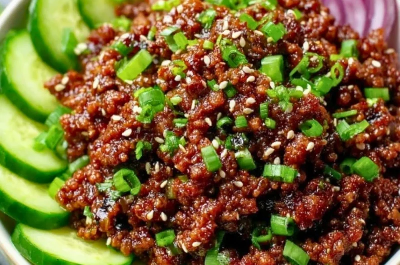 Spicy Keto Korean Beef served with a refreshing cucumber salad