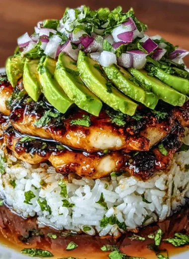 Delicious honey lime chicken served with avocado rice stack.