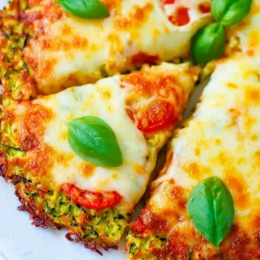 Homemade Zucchini Pizza Crust topped with fresh ingredients