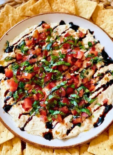 Delicious homemade bruschetta dip served with crispy bread