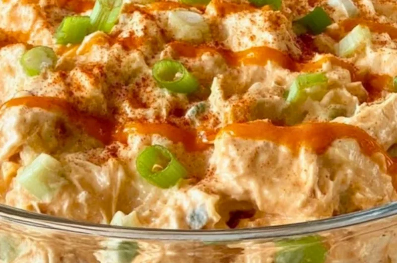 Delicious Buffalo Chicken Salad with spicy chicken, fresh greens, and toppings