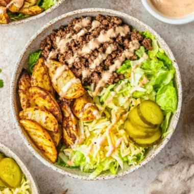 Delicious burger bowls with fresh ingredients and toppings.