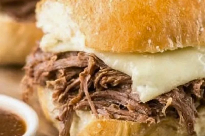 Crock Pot French Dip sandwich served with au jus sauce