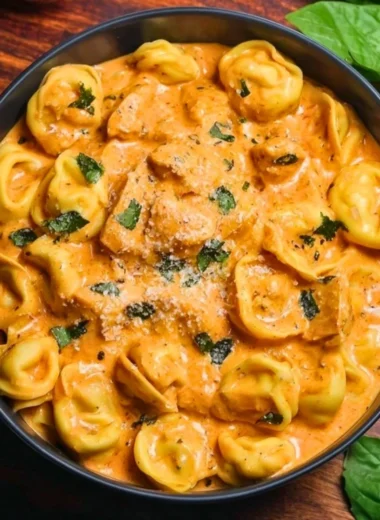 Delicious CrockPot Chicken Tortellini served in a bowl
