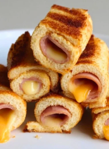 Delicious Grilled Cheese Roll-Ups served on a plate