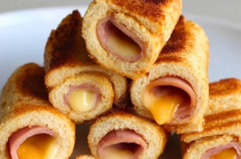 Delicious Grilled Cheese Roll-Ups served on a plate