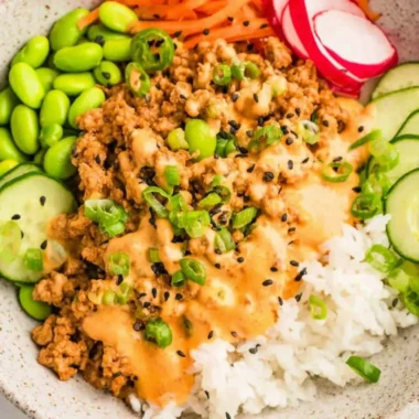 Ground turkey rice bowls topped with spicy Bang Bang sauce
