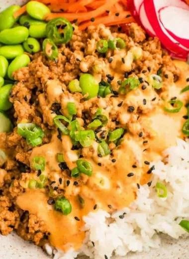 Ground turkey rice bowls topped with spicy Bang Bang sauce
