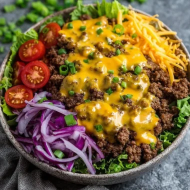 High-protein cheeseburger bowl with ground beef and burger sauce