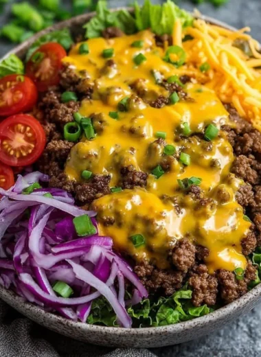 High-protein cheeseburger bowl with ground beef and burger sauce