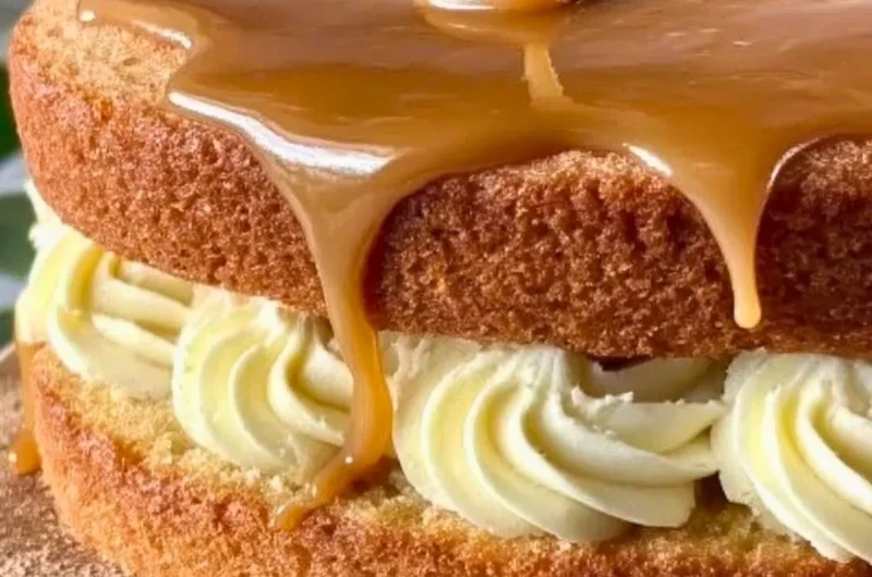 Delicious homemade Irish Whiskey Cake served on a rustic wooden table.