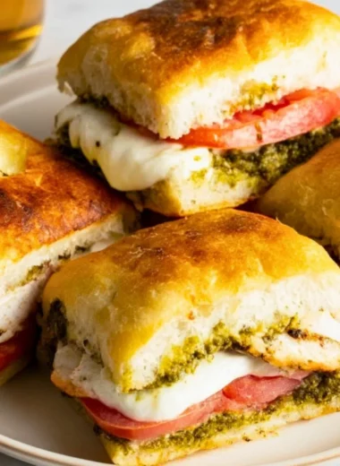 Toasted chicken pesto sandwich with juicy chicken and fresh basil pesto