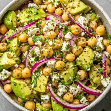 Chickpea Feta Avocado Salad with vibrant vegetables in a bowl