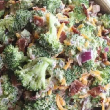 Keto broccoli salad with creamy dressing and crunchy toppings