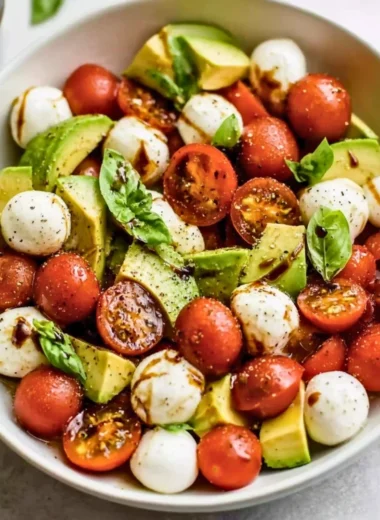 Light Avocado Caprese Salad with mozzarella, tomatoes, and basil
