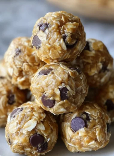 No-bake peanut butter energy bites arranged on a plate.