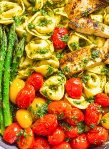 One-Pan Pesto Chicken with tortellini and colorful veggies