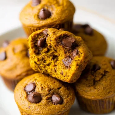 Homemade Pumpkin Protein Muffins topped with nuts and seeds