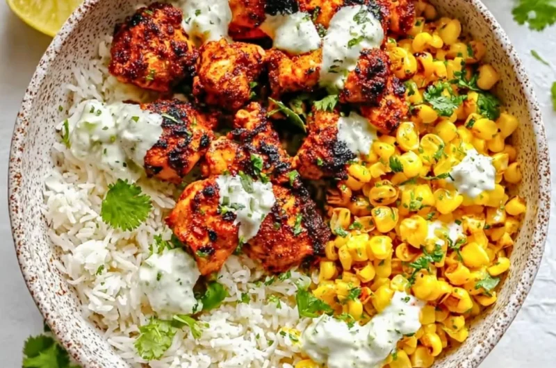 Delicious Street Corn Chicken Rice Bowl topped with fresh ingredients
