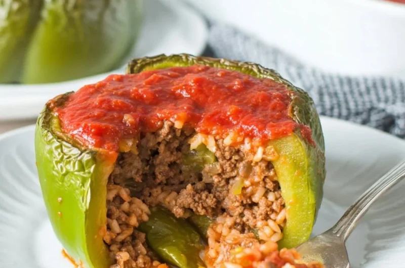 Delicious classic stuffed peppers filled with a savory mixture of rice and vegetables.