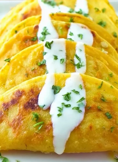 Delicious crispy potato tacos served with fresh toppings