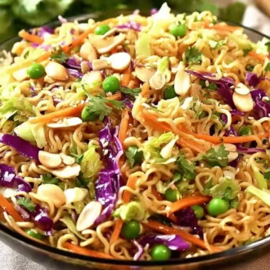 Bowl of crunchy Asian ramen noodle salad with fresh vegetables
