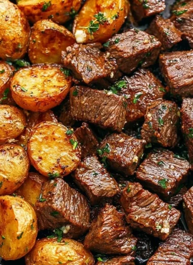 Delicious Garlic Butter Steak Bites served with golden crispy potatoes.