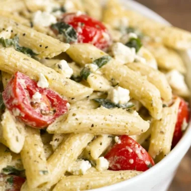 Colorful Greek Pasta Salad with fresh vegetables and feta cheese