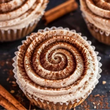 Mini No Bake Cinnamon Roll Cheesecakes in decorative serving cups