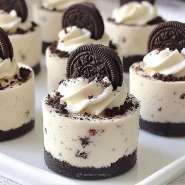 Delicious no-bake Oreo cheesecakes topped with Oreo cookie crumbles